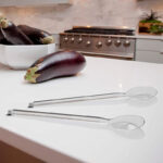 set-juego-par-ensalada-plastico-transparente-italiano-biesse-en-uso-en-cocina.jpg