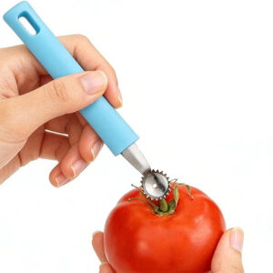 cuchara sacavocado extractor tallo tomate acero inoxidable en uso